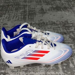 Adidas White Cleats with Blue and Red Accents